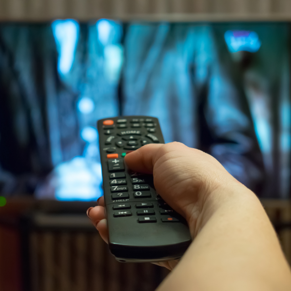 Man watching TV, commercial examples